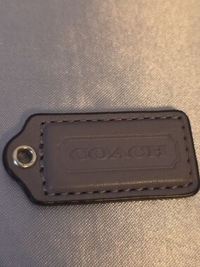COACH Leather Bag Tag in Gray or Taupe